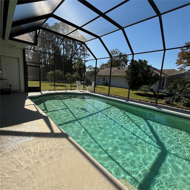 view of pool featuring a patio and a lanai