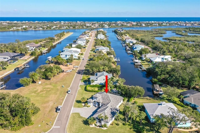 drone / aerial view featuring a water view