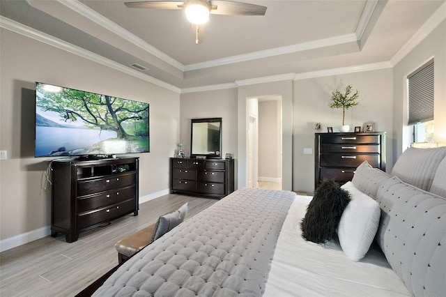 bedroom with multiple windows, ceiling fan, and crown molding