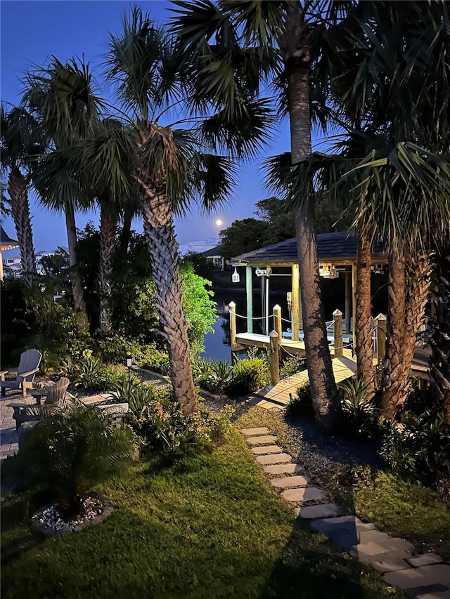 100 Seaside Pt, Flagler Beach, FL 32136 - view of yard with a patio area and a boat dock