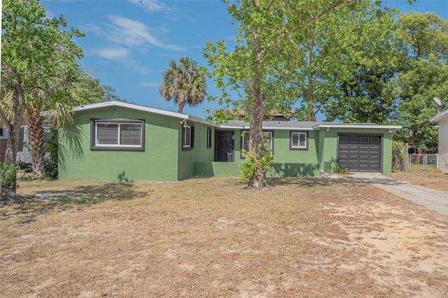 single story home with a garage