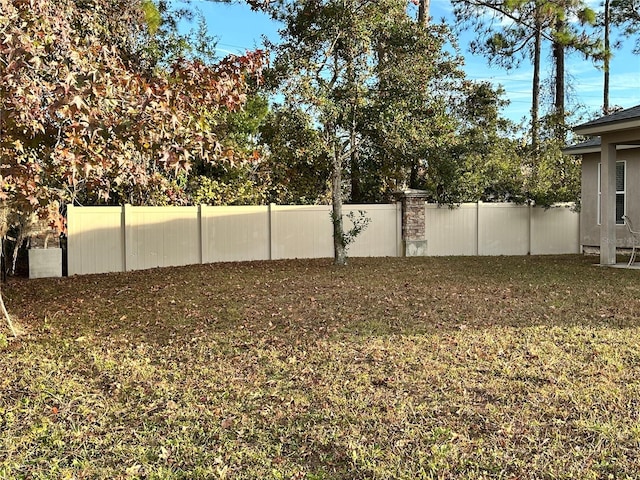 view of yard with fence