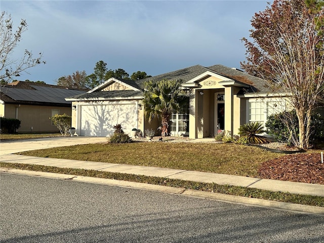 single story home featuring a garage, driveway, and stucco siding