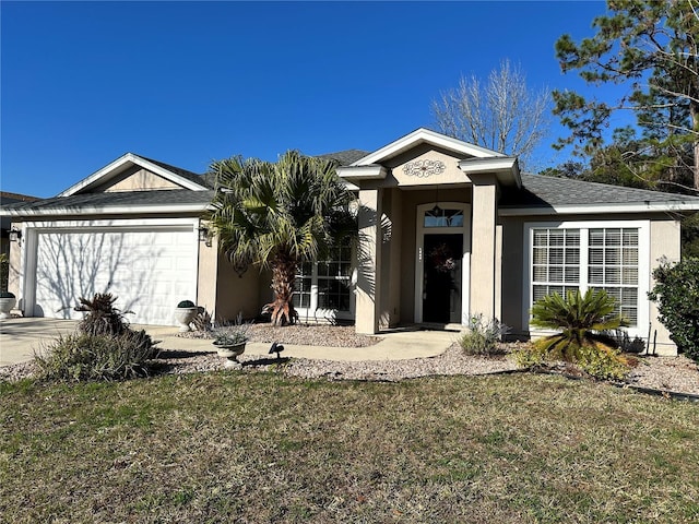 single story home featuring an attached garage, concrete driveway, roof with shingles, stucco siding, and a front lawn