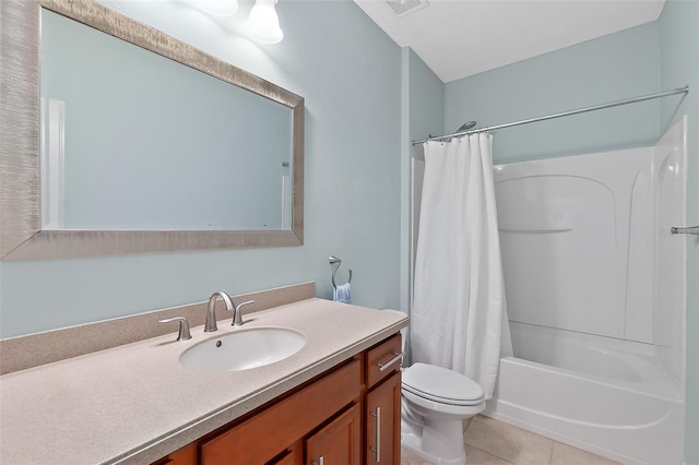 full bathroom with tile patterned flooring, shower / bath combo, vanity, and toilet