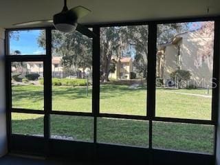 unfurnished sunroom with plenty of natural light