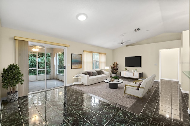 living room featuring vaulted ceiling and ceiling fan