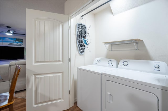 laundry area with washer and clothes dryer, ceiling fan, and hardwood / wood-style floors