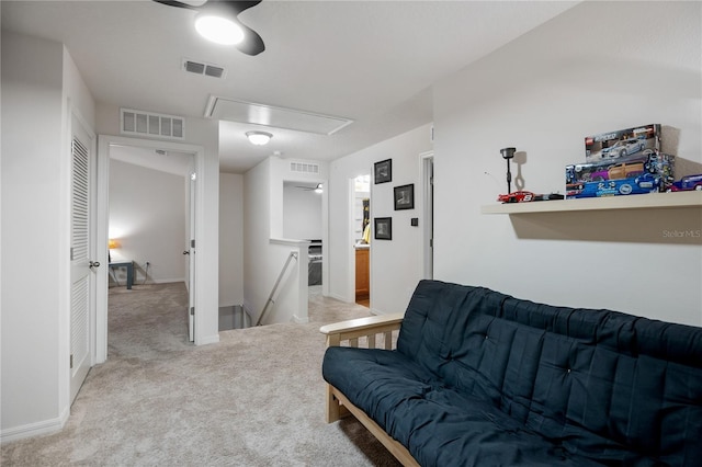 living room featuring light carpet