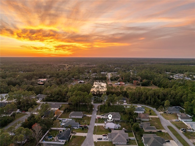 view of aerial view at dusk