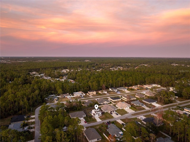 view of aerial view at dusk