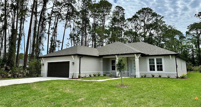 view of front of property featuring a garage, stucco siding, concrete driveway, a front yard, and roof with shingles