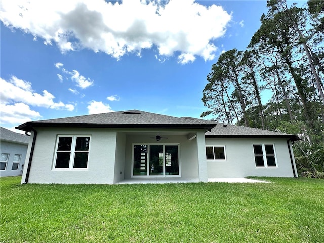 6 Lake Pl, Palm Coast, FL 32137 - rear view of property featuring a ceiling fan, stucco siding, a yard, and a patio