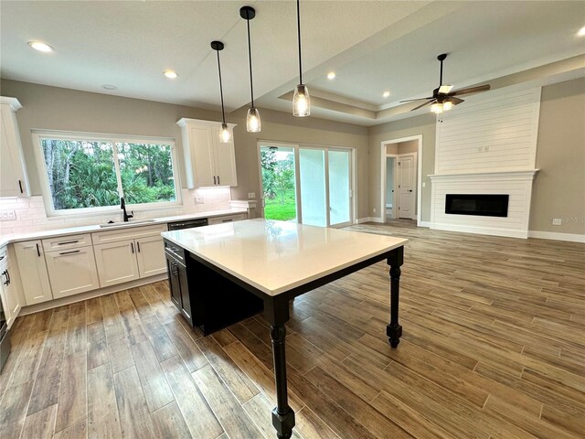 6 Lake Pl, Palm Coast, FL 32137 - kitchen featuring a sink, tasteful backsplash, a ceiling fan, light countertops, and recessed lighting