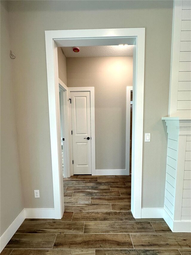 6 Lake Pl, Palm Coast, FL 32137 - corridor with wood finished floors and baseboards