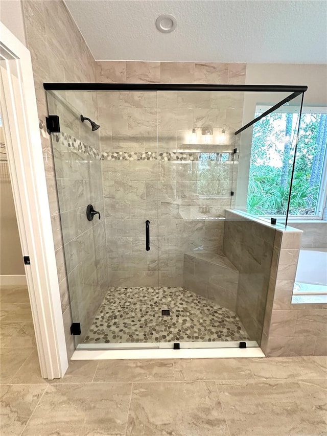 6 Lake Pl, Palm Coast, FL 32137 - full bath with a stall shower and a textured ceiling