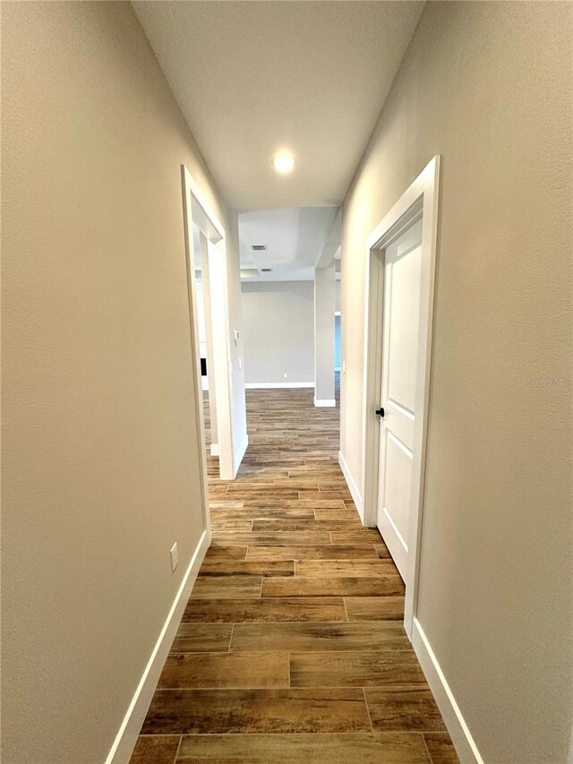 6 Lake Pl, Palm Coast, FL 32137 - hallway with wood finished floors, baseboards, and recessed lighting