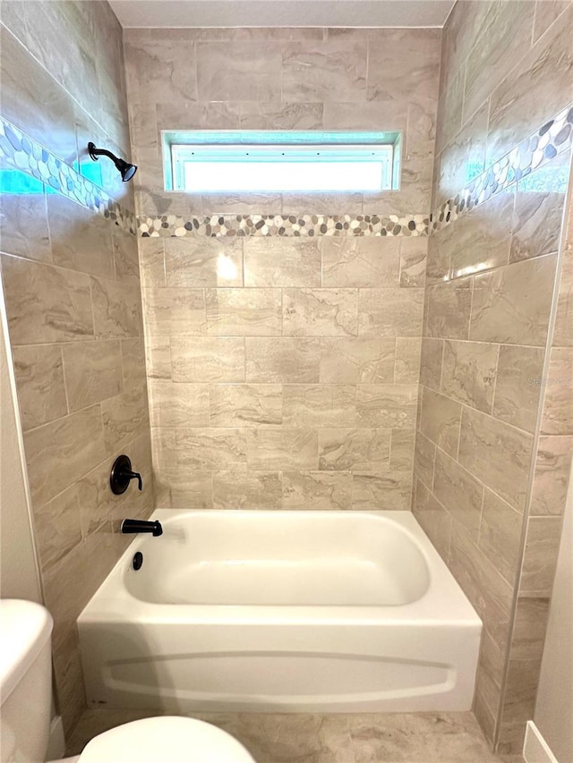 6 Lake Pl, Palm Coast, FL 32137 - bathroom featuring toilet and  shower combination