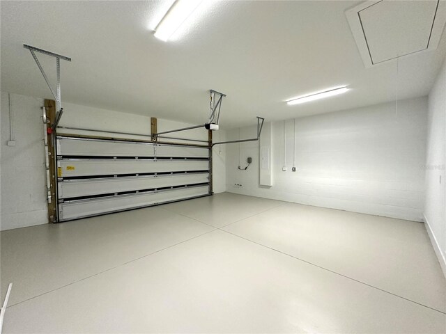 6 Lake Pl, Palm Coast, FL 32137 - garage featuring a garage door opener