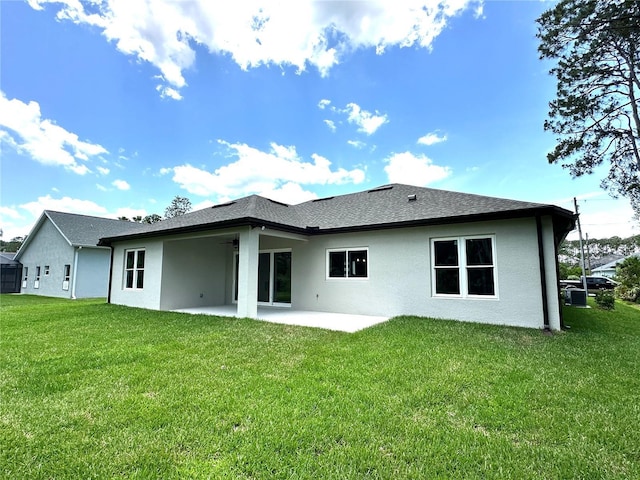6 Lake Pl, Palm Coast, FL 32137 - rear view of house with a patio area, a yard, stucco siding, and central air condition unit