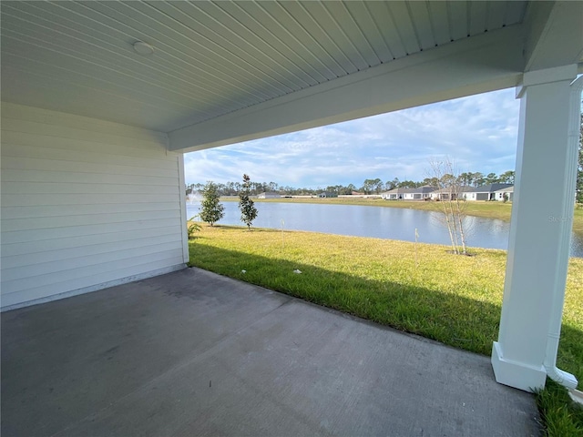 view of patio / terrace featuring a water view