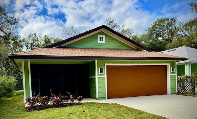 garage with a yard