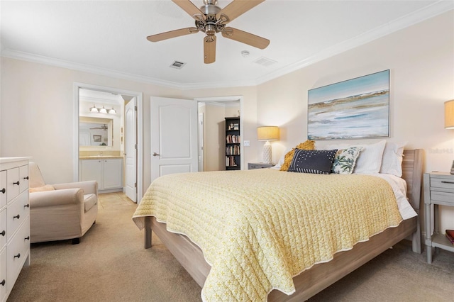 carpeted bedroom with ensuite bathroom, ceiling fan, and ornamental molding