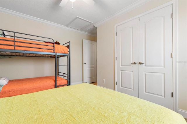 bedroom with a closet, ceiling fan, and ornamental molding