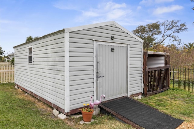 view of outdoor structure with a yard