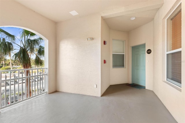 view of patio featuring a balcony