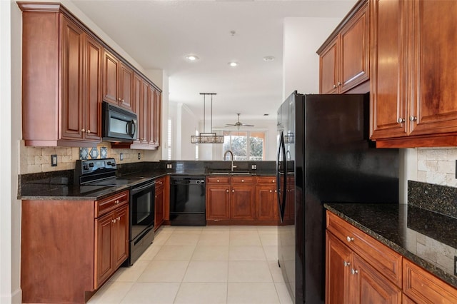 kitchen with ceiling fan, sink, tasteful backsplash, pendant lighting, and black appliances