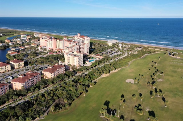 bird's eye view with a water view and a view of the beach