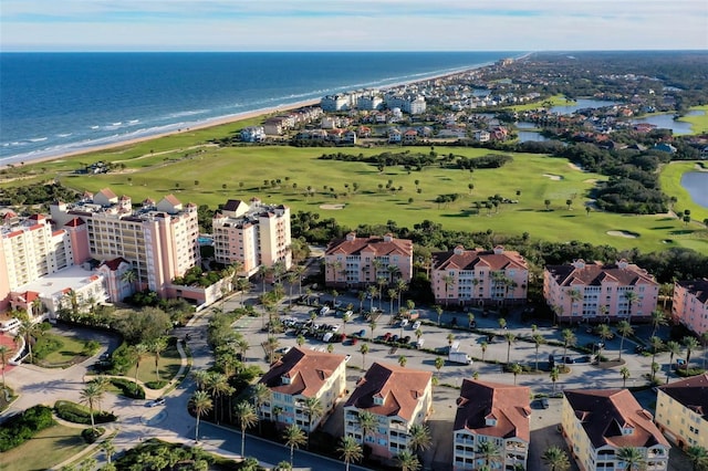 aerial view with a view of the beach and a water view