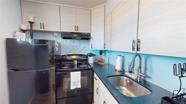 kitchen featuring a textured ceiling, sink, and black appliances