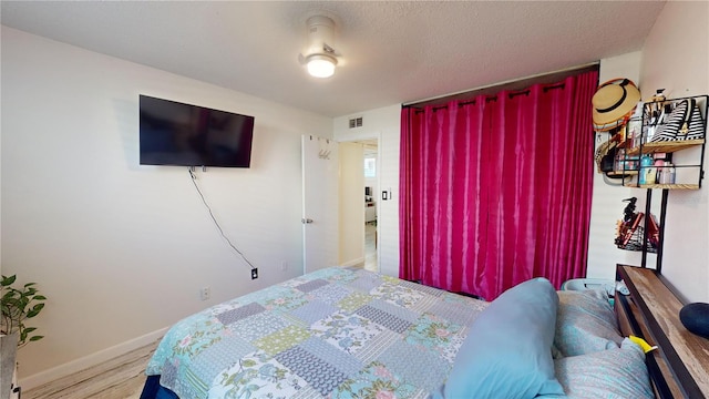 bedroom featuring light wood-type flooring