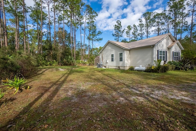 view of home's exterior featuring a lawn