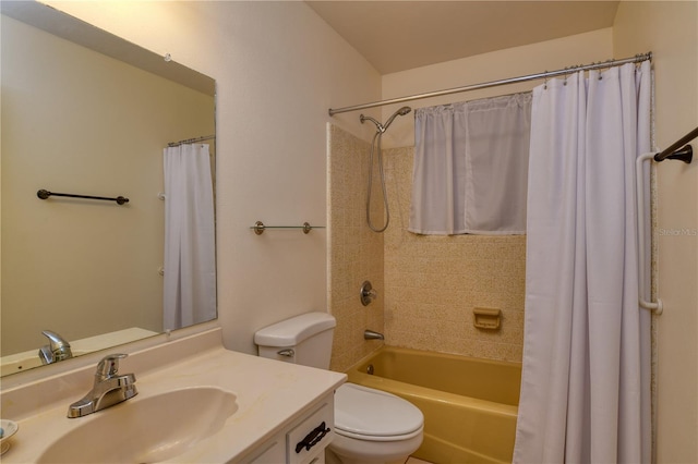 full bathroom with shower / bath combo, vanity, and toilet