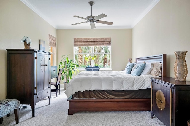 bedroom with ceiling fan, crown molding, and light colored carpet