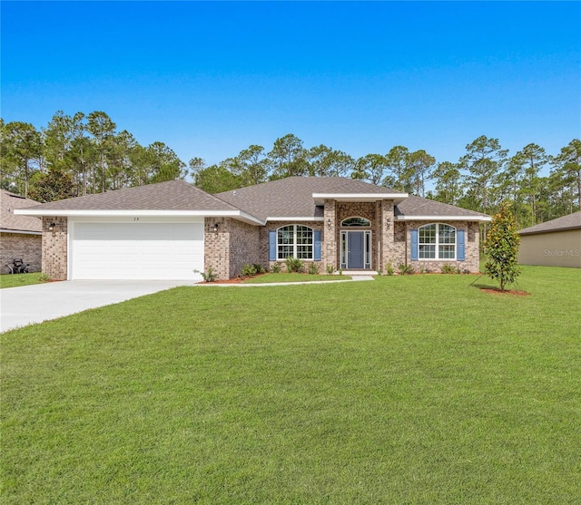 ranch-style house with a garage and a front yard