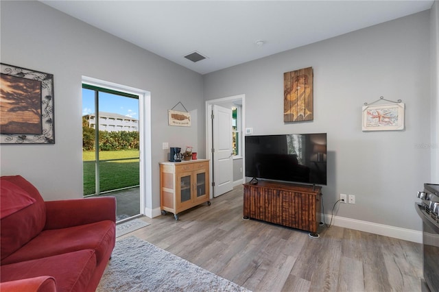 living room featuring light wood-type flooring