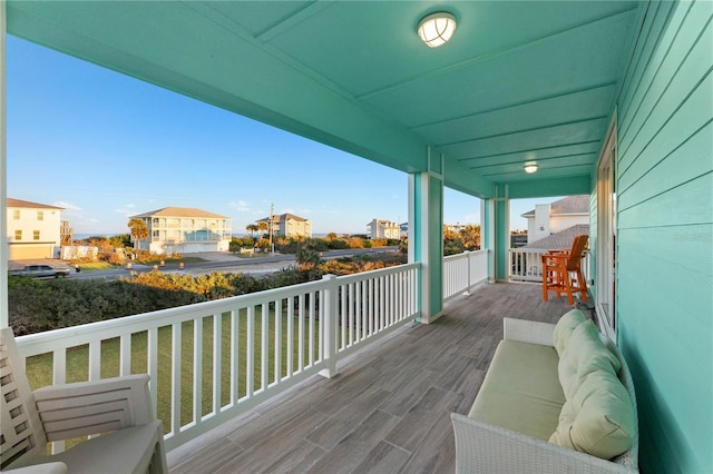 wooden deck with a yard