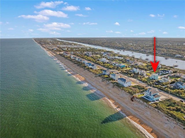 aerial view featuring a view of the beach and a water view