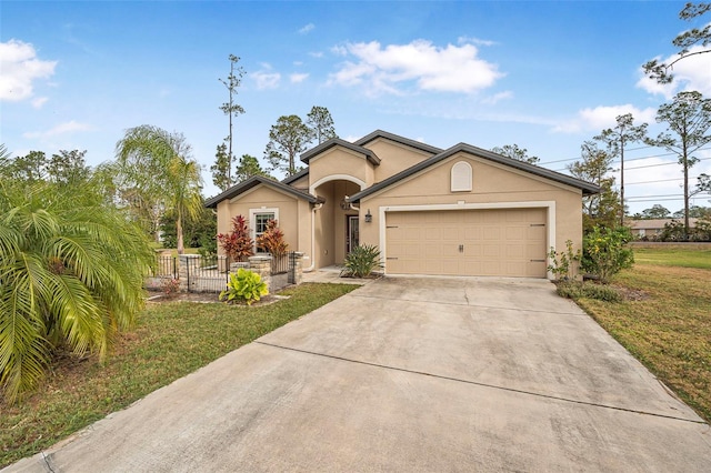 ranch-style home with a garage and a front yard