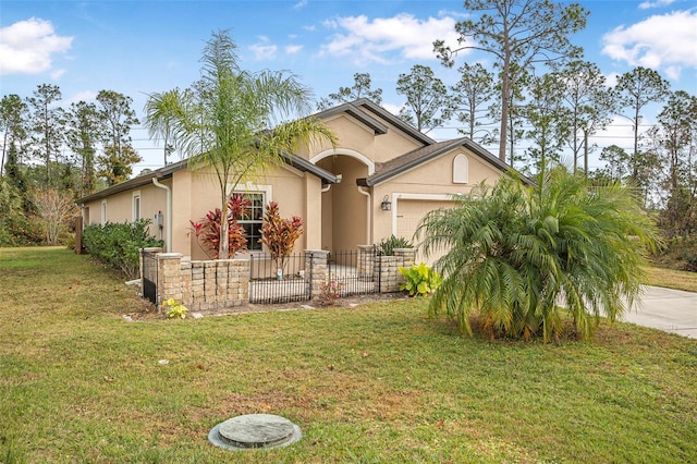 view of front of house with a garage and a front lawn