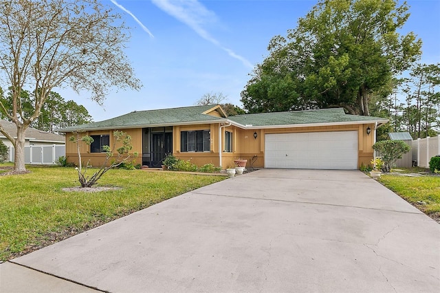 single story home featuring a front lawn and a garage