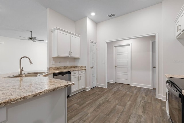 kitchen with ceiling fan, dark hardwood / wood-style flooring, stainless steel dishwasher, white cabinets, and sink