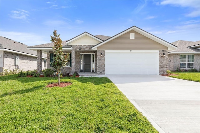 view of front of house with a garage and a front yard