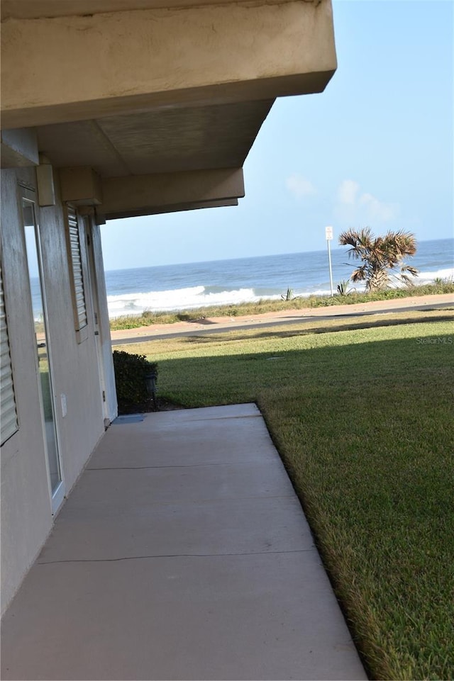 view of patio / terrace with a water view