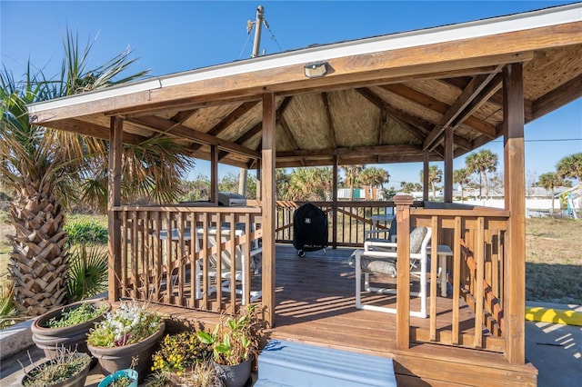 wooden deck with a gazebo