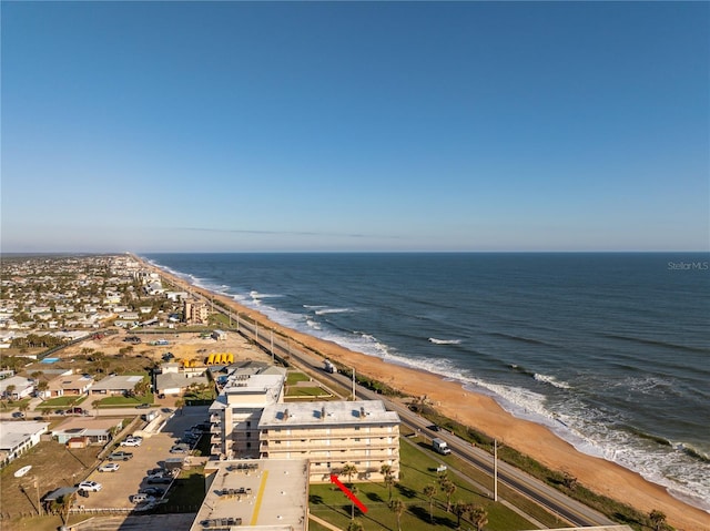 aerial view featuring a beach view and a water view